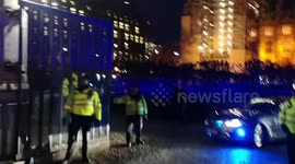 Brexit protesters yell 'traitor' at PM as she leaves Parliament
