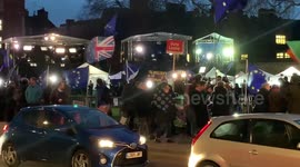 Crowds of protesters jostle outside U.K. Parliament as Brexit is delayed