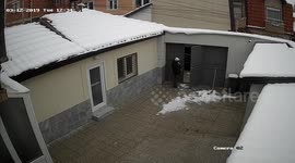 Instant karma as man gets hit with falling snow drift after arguing with wife