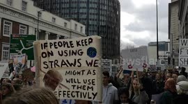 Young climate change protesters chant during walkout in London