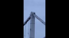 A young guy climbed to the top of the Crimean bridge in Moscow.