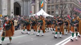 NYC: Bagpipers march past St. Patrick's Cathedral during St. Patrick's Day Parade