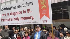 Anti-abortion protesters pray along NYC St Patrick's Day parade route