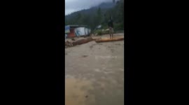 Flood Material Scattered On The Sentani Road , Indonesia