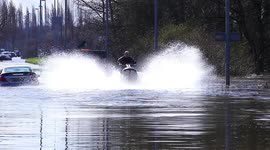 Man on jet-ski makes the most of flooding on submerged Yorkshire roads