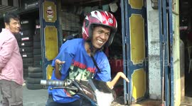 Man with rare arm deformity shows how he can ride a motorcycle
