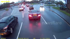Lorry and car collide on roundabout approach