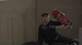 Great catch! Kid somehow plucks his skateboard from mid-air after fall