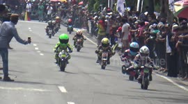 Whizz kids! Brave children as young as nine compete in Indonesia's mini-Moto Grand Prix
