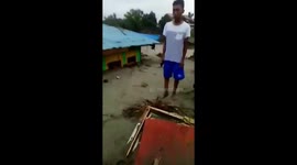 Indonesian residents left with homes covered in mud after deadly flash floods