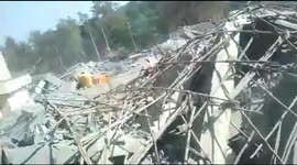 Two killed, dozens feared trapped in debris of collapsed under construction building in India