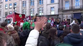 St Patricks Day Parade in London - crowds cheer The Irish World float in Trafalgar Square