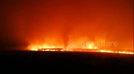 Firefighters battle major forest fire at China-Russia border