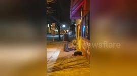 Newsflare Edit - Two men in the US throw punches into mid-air on St Patrick's Day