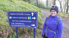 Surprise proposal up a mountain during a staged treasure hunt