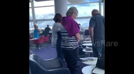 Travellers in Australia fall silent for New Zealand mosque victims