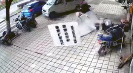 Scooter driver blindsided by billboard blown down in strong winds