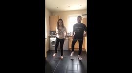 Mum wouldn't buy these siblings a dance mat- so they use the kitchen tiles