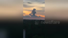 Cloud shaped like a girl seen floating above horizon in China