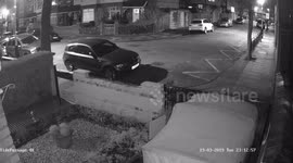 Two guys rummaging through cars