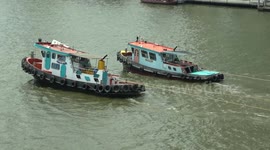 Tugboats Hauling Barges in Bangkok