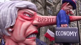 Theresa May's sculpture with long nose floating at People's Votes March in London, UK