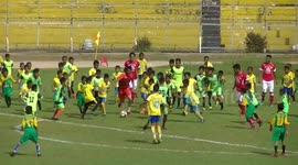 Watch 380 children take on a team of eight pro soccer players in Indonesia
