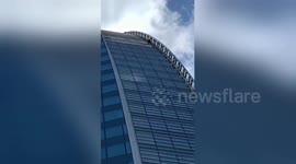 'French Spiderman' climbs Paris skyscraper without safety gear