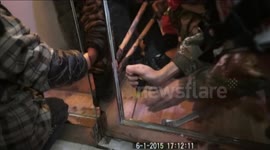 Firefighters free boy's wrist from door in China