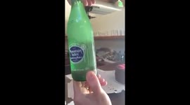 Bottled water flashfreezes on opening