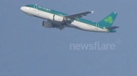 Plane aborts landing attempts in strong winds