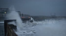 Storm waves batter Scotland train line