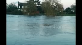 River Thames swollen and racing in the start of 2015 food