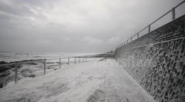 Sea foam hits North Wales beach