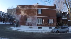Man creates 'Ice-mist' waterfall from top of building
