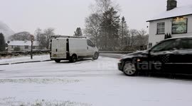 Cars skid in Cumbria snow