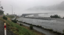 New Zealand bridge washes away as 'monster' rainstorm batters South Island
