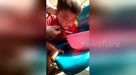 Stomach-churning moment leech is pulled from boy's nose