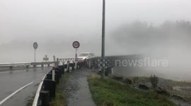 Floodwaters batter Waiho River bridge moments before collapse