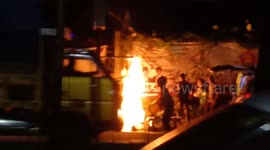 Stove catches fire at Indonesian street vendor