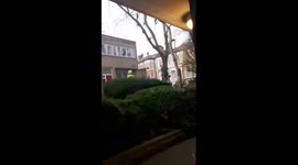 Kilburn  2 robbers escaping on roof with gun
