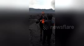 German tourist wrestles park ranger to the ground after being caught trying to hike on erupting volcano