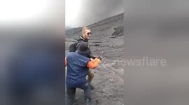 German tourist wrestles park ranger to ground after trying to hike erupting Indonesia volcano