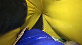 Man films his experience inside tent being battered by Scottish storm.