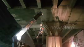 Lost kitten rescued after getting trapped under motorway bridge in Thailand