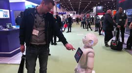 Robot Pepper is communicationg with people at MTEX in London