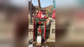 Chinese villagers build ‘peeing boy’ statue to divert spring water from mountain