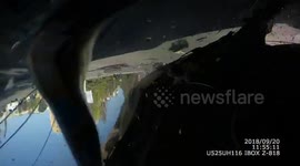 Dash-cam footage from Russia shows moment of roll-over crash after collision