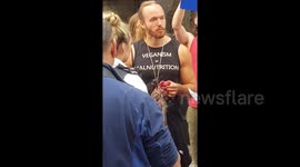 Anti-vegan protester eats raw squirrel in front of shocked Londoners