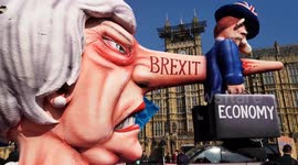Anti-Brexit protesters bring long-nosed Theresa May back to Westminster